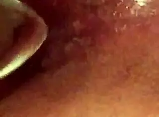 She enjoys butt plug insertion in her tight ass for anal pleasure.