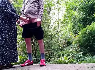 brunette cougar with big tits takes two cocks