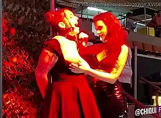 spanish fat woman on stage receives wax treatment