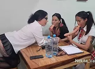 Teacher Dominates Students In Lesbian Threesome With Dildo