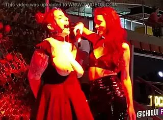 spanish fat woman on stage receives wax treatment