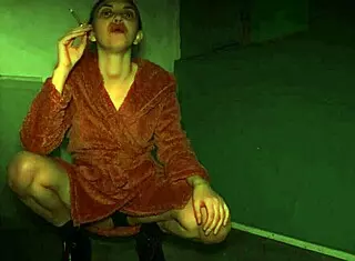 Watch her smoke and spit in high heels while dressed up! It's a fetish homemade video with voyeur elements.