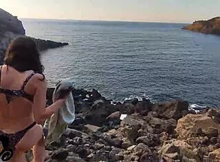 Rough Fuck Doll Moans During Web Chat, Gets Cum In Mouth On Cliff By The Sea