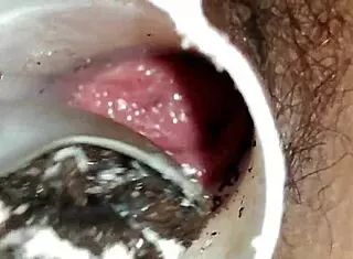 She playfully teases her pussy with an oreo in this fetish scene.