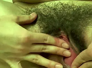 Veronira plays with hairy pussy