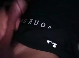 Guy in tight workout clothes jerks off on bed