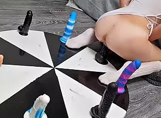 i watched my petite stepsister win her orgasm playing wheel of dildos