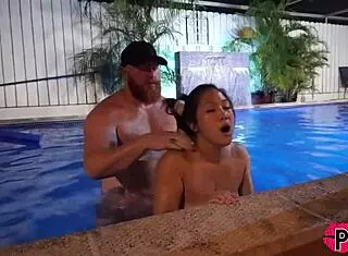 Asian Slut Gets Creampied In Pool After Gagging On Cock