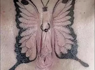 crystal butterfly's tattoo shines under the music's spell