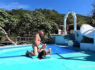 Tattooed Latina gets wild by the pool with sloppy doggystyle banging. Her big pussy takes a monster cock hard.