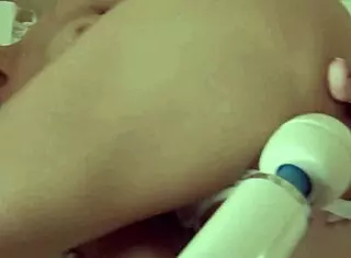 Teen Erin O Vibrates Nipples with Hitachi