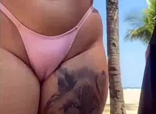Young African exhibitionist slapped on butt at beach, shocked but sucked him off