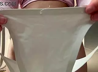 she builds her panty collection, teases with wet pussy flashes during solo play.