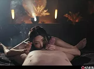 Japanese girl teases with dirty talk and cigarette smoke on cock