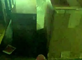 a mexican guy jacking off at his work desk, trying to stay hidden