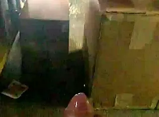 a mexican guy jacking off at his work desk, trying to stay hidden