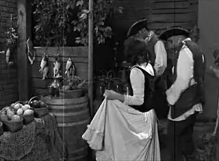 Three men take turns with a playful village girl.