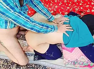 Desi hot couple engages in rough anal fucking in bedroom with doggystyle