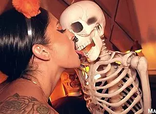 Watch the voodoo whore take a creampie in her huge asshole during halloween.