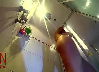 Hidden camera captures young 18+ girl stripping naked in shower room