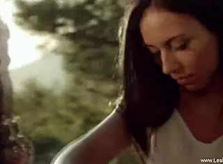 Martina, the brunette milf, uses strapon and dildo to help blonde babe Nikol explore lesbian pleasures with her girlfriend.