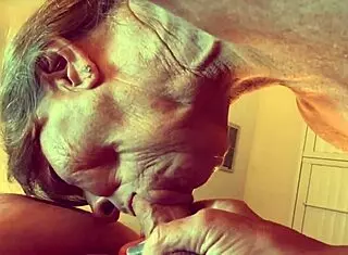 granny velma dinkley sucks cock in open bathrobe pov