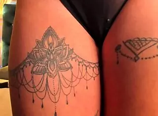 squirting stream brings the brunette's swollen shaved pussy to intense orgasm with dildo