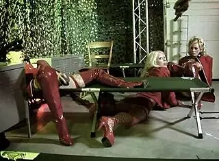 Bisexual women play with dildo and join soldiers for group sex