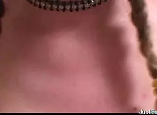 Pigtailed Brunette Plays With Big Tits