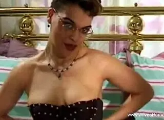 Redhead cougar fingers her wet pussy