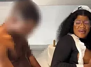 Ebony maid rides boss