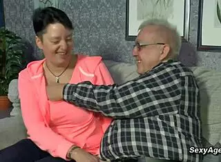 Watch This German Cougar Wife Get Passionate Blowjob Fucking on Sofa!