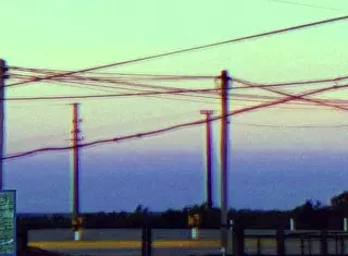 watch this stripper do a hot striptease with ripped clothes to the music