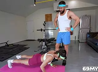 Steaming hot milf Penny Barber engages in an intense workout session with her trainer at the gym.