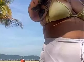 Oh no, these shorts are showing my big pussy at the beach!