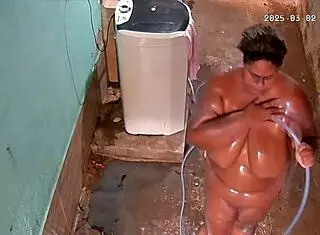 hidden camera catches stepmother bathing and showing off in backyard