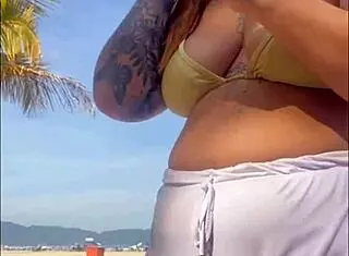 Oh no, these shorts are showing my big pussy at the beach!