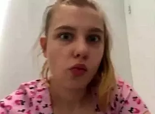 Young teen masturbates with dildo in locker room