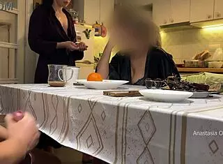 Husband jerks under kitchen table in front of milf stepmom