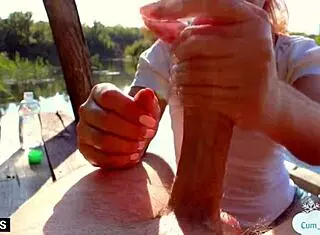 A MILF jerks off a stranger outdoors for cash in POV