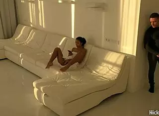 Black asian teen jumping in white room