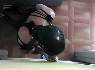 Preview Of Woman In Fishnet Catsuit And High Heels At Gloryhole