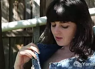 Brunette Dion with tattoos masturbates to orgasm outdoors using vibrator