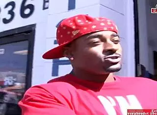 The busty brunette receives a cumshot on her silicone tits from the big black cock