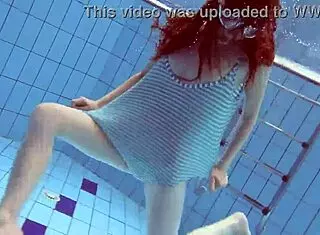 Libuse, the sexy petite Russian teen with small tits, hangs out at the pool and beach with her blonde girlfriend babe.