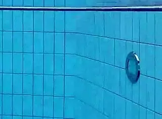 Libuse, the sexy petite Russian teen with small tits, hangs out at the pool and beach with her blonde girlfriend babe.