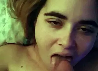 In a casual homemade scene, the brunette wife passionately sucks her hubby's cock in POV.