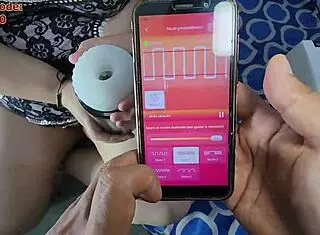 using svakom sam neo on his cock while sucking balls