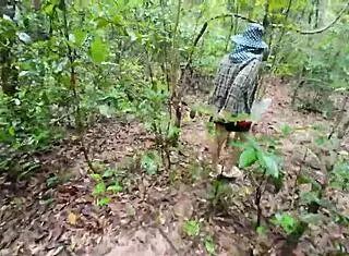 i feel so excited and naughty as this thai teen walks chatting picking mushrooms in the forest showing off cosplay in nature alone