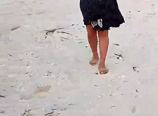 Mexican Whore Exhibits Tits and Ass on Public Beach
